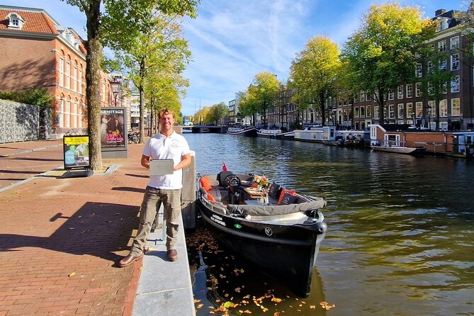 Amsterdam Canal Cruise on a Small Open Boat (Max 12 Guests) - Booking Details and Cancellation Policy
