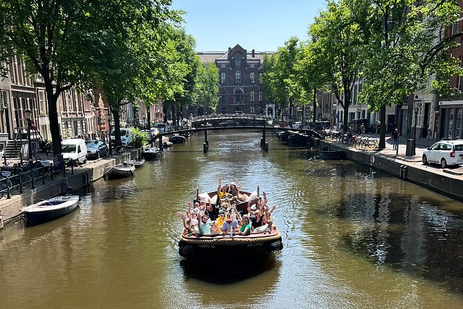 Amsterdam Luxury Boutique Boat Tour With Unlimited Beer and Wine - Inclusions and Amenities