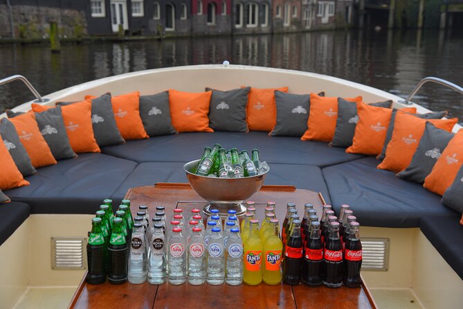 Amsterdam Private Boat Trip With Skipper, Burger and Beers - Experience Highlights