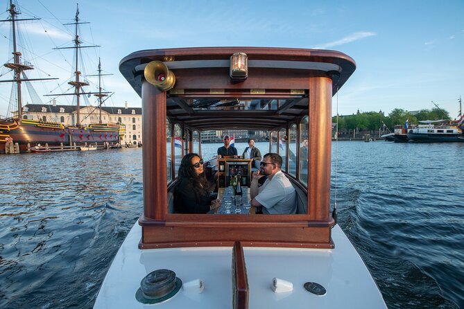 Private Boat Tour Amsterdam - 90 Min Incl. Welcome Drink on Historic Saloon Boat - Experience Overview