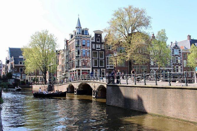 Amsterdam Canal Cruise on a Small Open Boat (Max 12 Guests) - Personalized Experience on Eco-Friendly Boat