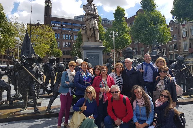 Historical Tour of Amsterdam With Italian Guide - Weather Policy