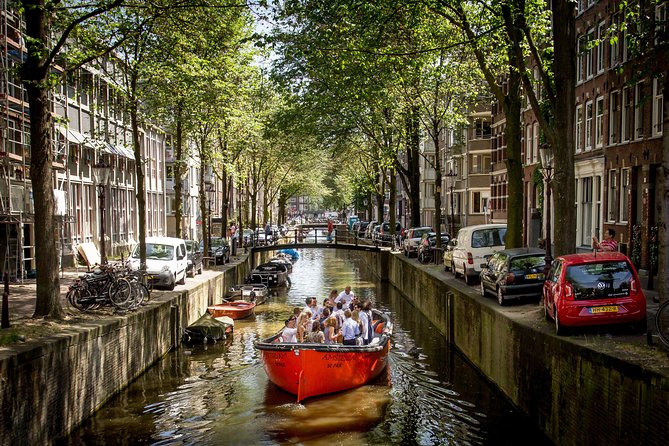 Luxury Boat Tour in Amsterdam With Bar on Board - Highlights of the Boat Tour