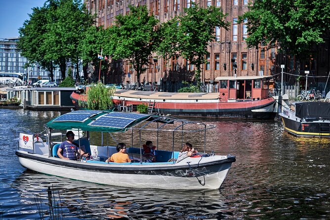 Private Family Tour Through the Small Canals of Amsterdam - Guide Details