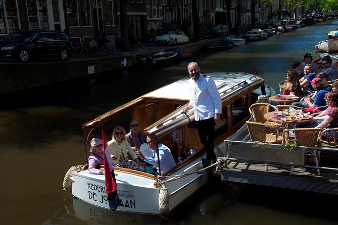 Private Guided Historic Amsterdam Canal Cruise in a Salon Boat - Logistics and Boarding Details