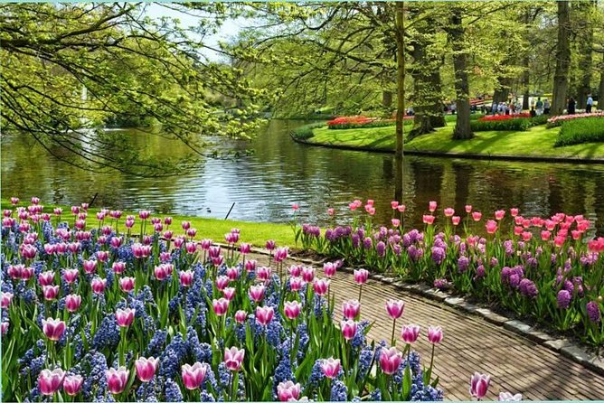 Day Trip to Keukenhof Gardens From Amsterdam With Tour Guide - Language and Guide Experience Insights