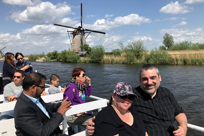 Kinderdijk Windmills, Delft City & Delft Blue Factory Visit - Host Interaction and Responses
