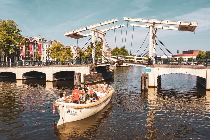 Amsterdam Canal Cruise With Live Guide and Onboard Bar - Weather Considerations and Additional Info