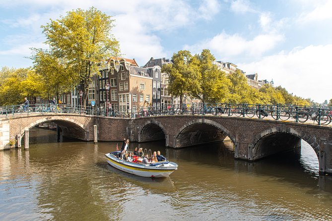 Amsterdam Small-Group Open Boat Tour Off The Beaten Track - Tour Highlights