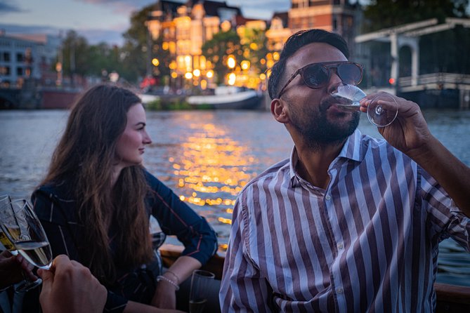 Private Boat Tour: Champagne Canal Cruise in Amsterdam - Historic Sights on Route
