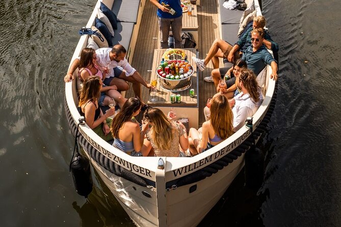 Amsterdam: Canal Booze Cruise With Unlimited Drinks - Inclusions and Duration