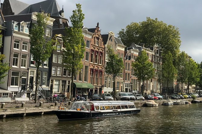 Amsterdam Canals Boat Tour With Audio Guide - Traveler Guidelines