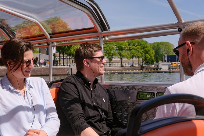 Amsterdam 1-Hour Sightseeing Canal Cruise by Semi-Open Boat - Booking Information and Reservations