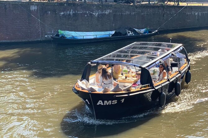 Amsterdam Small-Group Canal Cruise Including Snacks and Drinks - Small Group and Panoramic Views