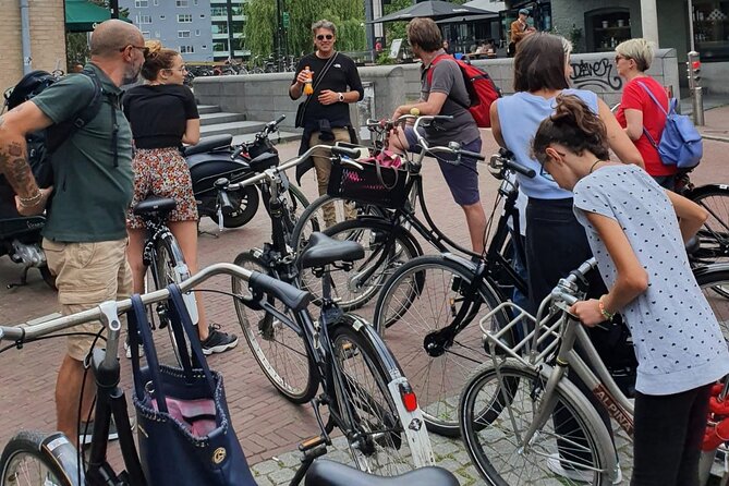 Bike Tour in Amsterdam With an Italian Guide - Minimum Travelers and Refund Policy