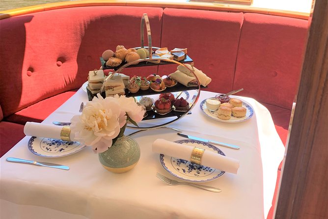 Cruise Through the Amsterdam Canals With High Tea and Wi-Fi on Board - Just The Basics