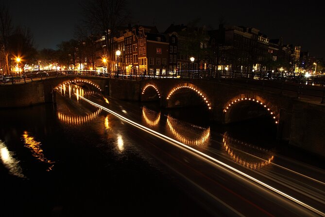 Mikes Amsterdam Light Festival Bike Tour With Gluhwein or Hot Chocolate - Tour Overview